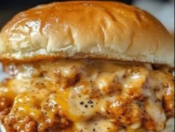 Cajun Chicken Sloppy Joes served on a plate with toppings