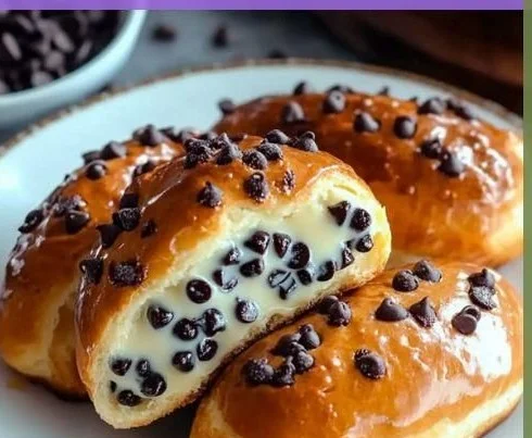 Chocolate Chip Vanilla Custard Brioches with melted chocolate