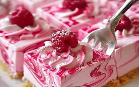 Easy no-bake raspberry dessert with whipped cream and fresh raspberries