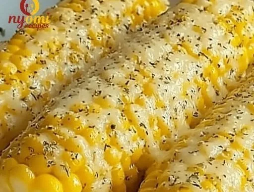 Garlic Parmesan Corn on the Cob served fresh on a platter