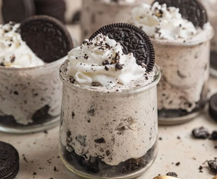 Delicious No Bake Oreo Cheesecake Cups topped with crushed Oreos