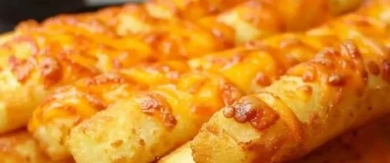Delicious homemade Potato Cheese Sticks served on a plate